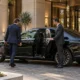 How Do I Get from Caloundra to Brisbane Airport? 2 Luxury chauffeur outside a city hotel
